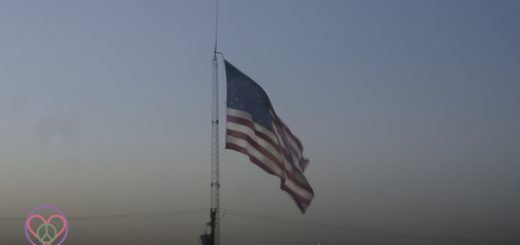 Image of American Flag flying at Dusk.